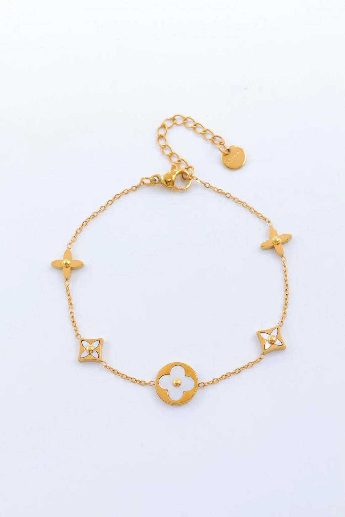 Bracelet en acier inoxydable doré et argenté avec motif fleur