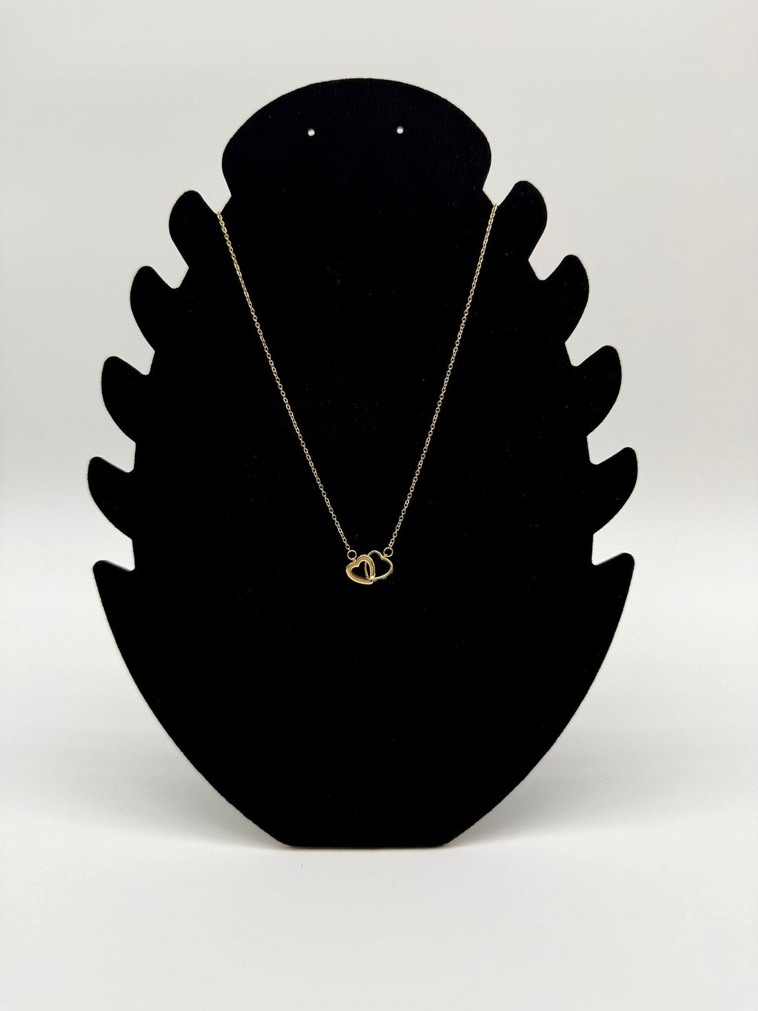 Collier en acier inoxydable doré avec pendentif double cœur entrelacé